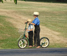 Amish children on scooter
